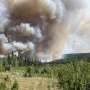 Facing unprecedented fire season, Canada confronts logistical challenge