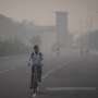 Masks are back, construction banned and schools shut as toxic air engulfs New Delhi