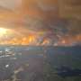 Canadian wildfire emergency spreads to second province